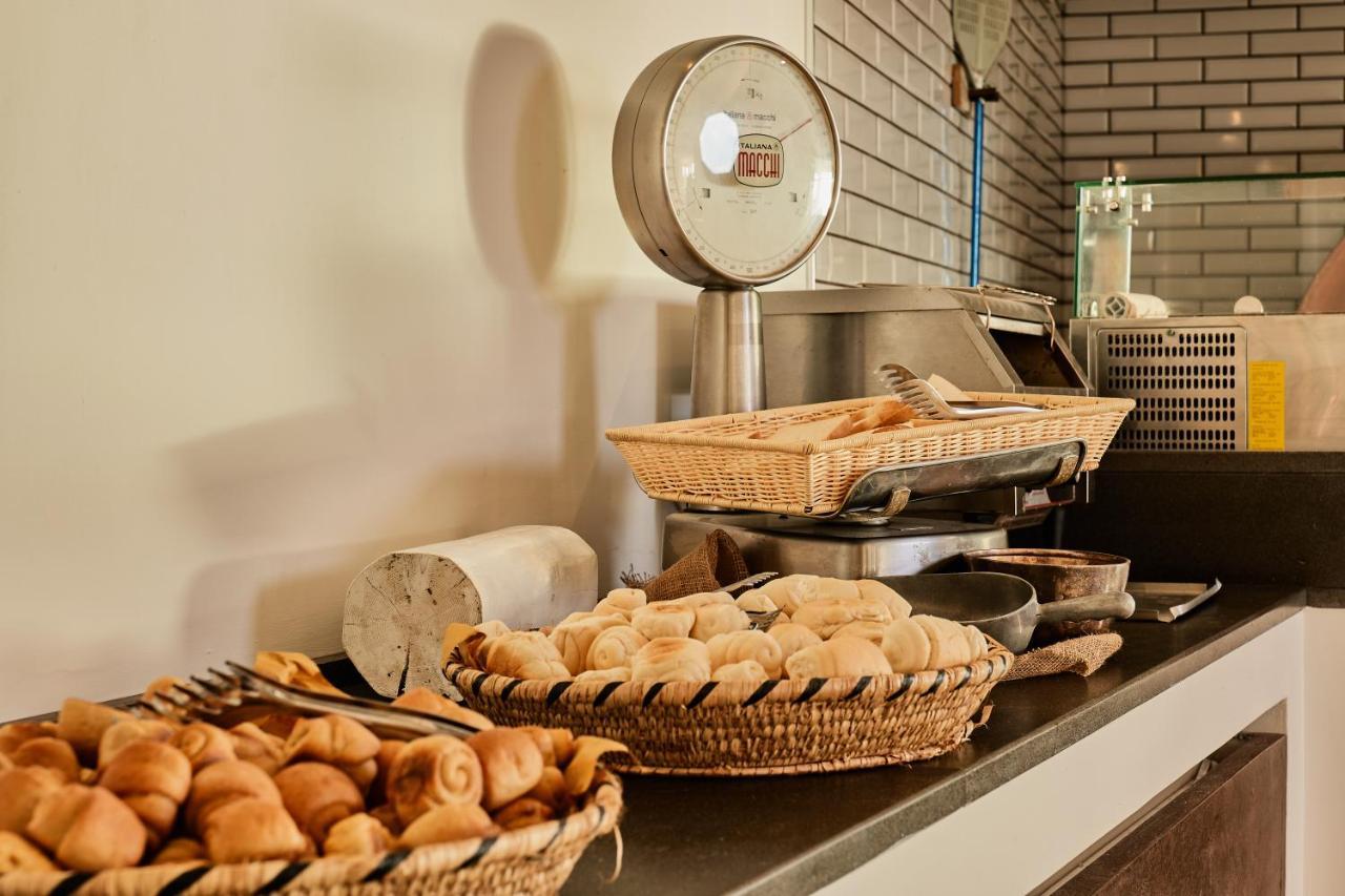 Club Esse Roccaruja Hotel Стинтино Екстериор снимка
