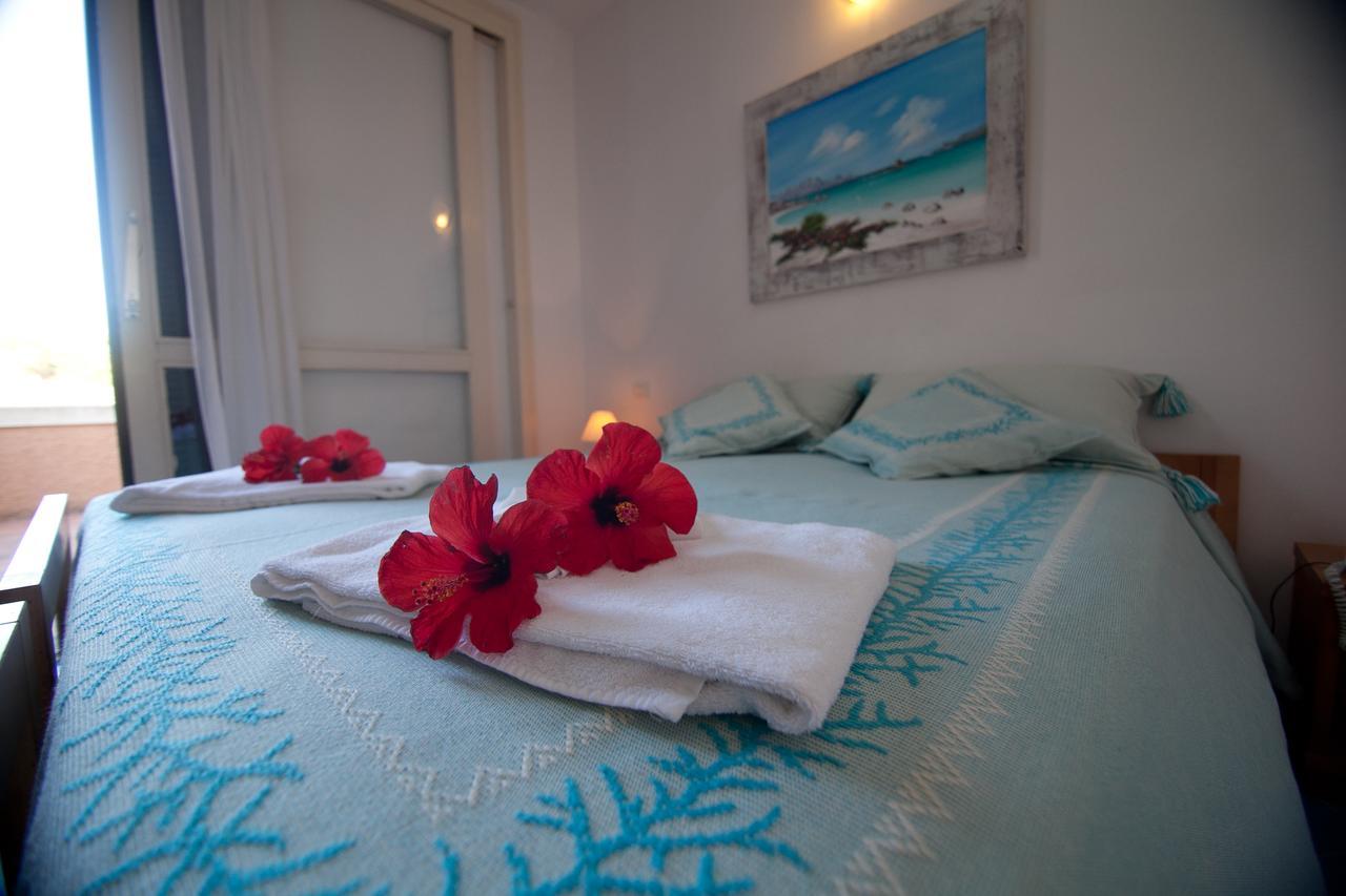 Club Esse Roccaruja Hotel Стинтино Екстериор снимка